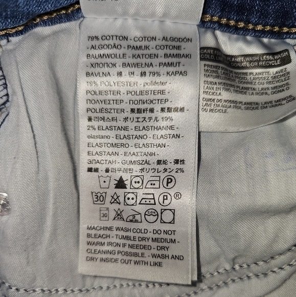 Levis Women's 711 Skinny Jean, Medium Wash, Mid Rise, Freyed Hem Size 33 - Picture 11 of 13